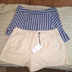 Lydelle Blue Strioed Shorts and Loveriche Beige Shorts In A Size Large.